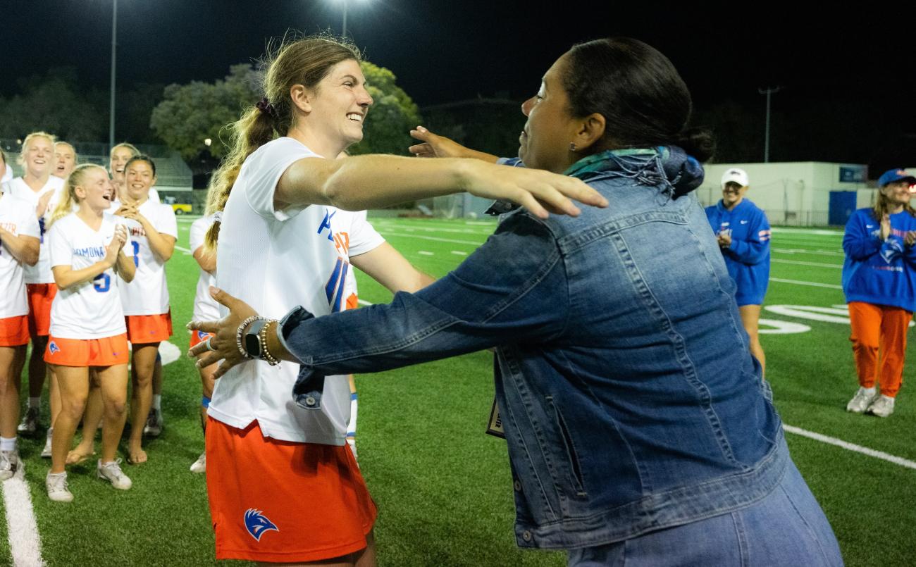 Two women go for a hug