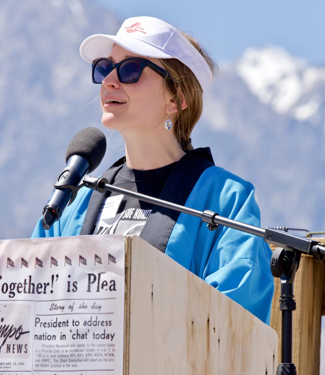 Monica Embrey '09, whose grandmother Sue Kunitomi Embrey was held at Manzanar, speaks at an earlier pilgrimage to the site.
