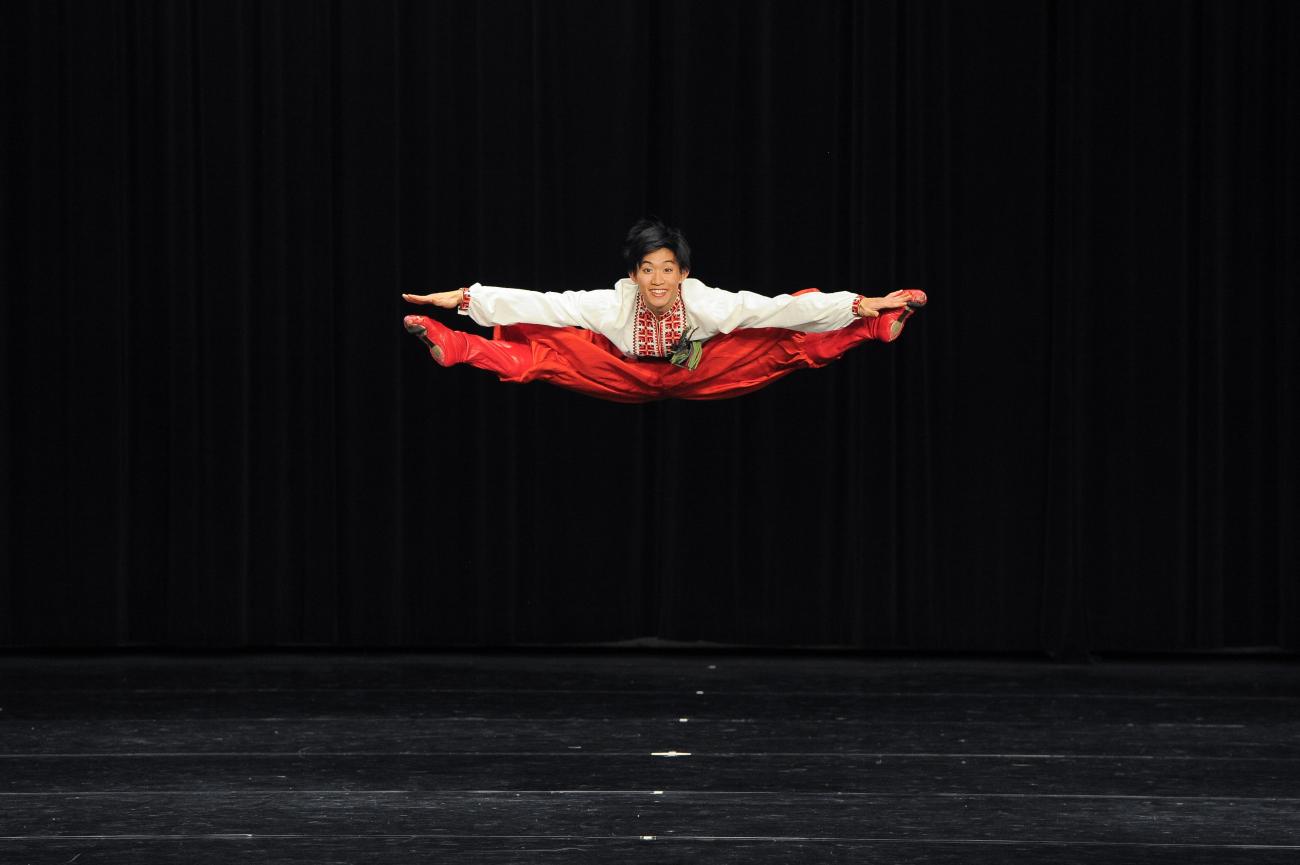Lawrence Chen jumping in air.