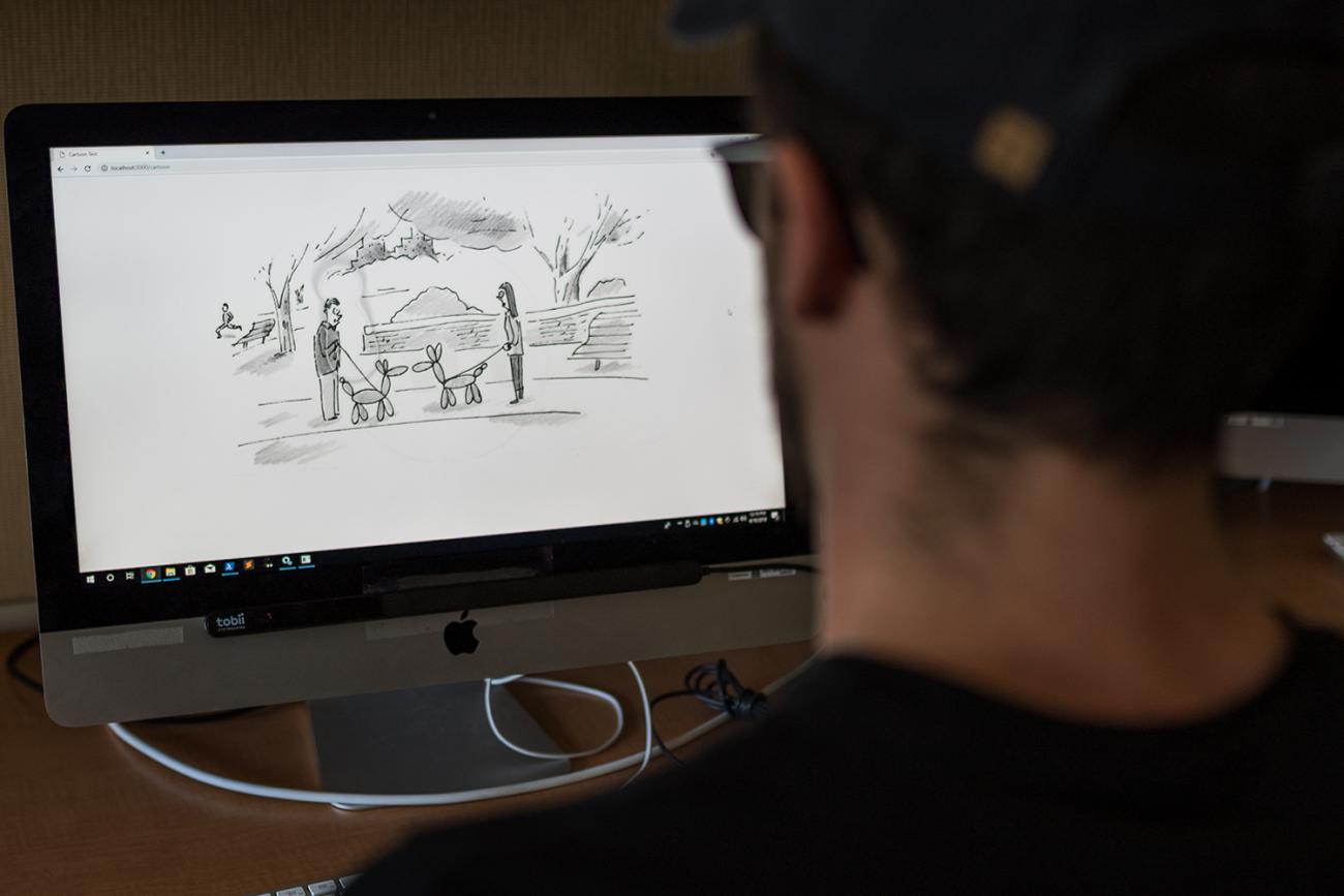 Computer screen with uncaptioned New Yorker cartoon