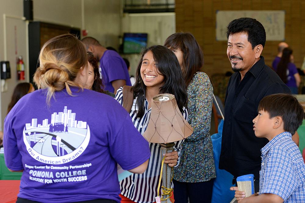 High school students being welcomed as they arrive on campus for the PAYS program