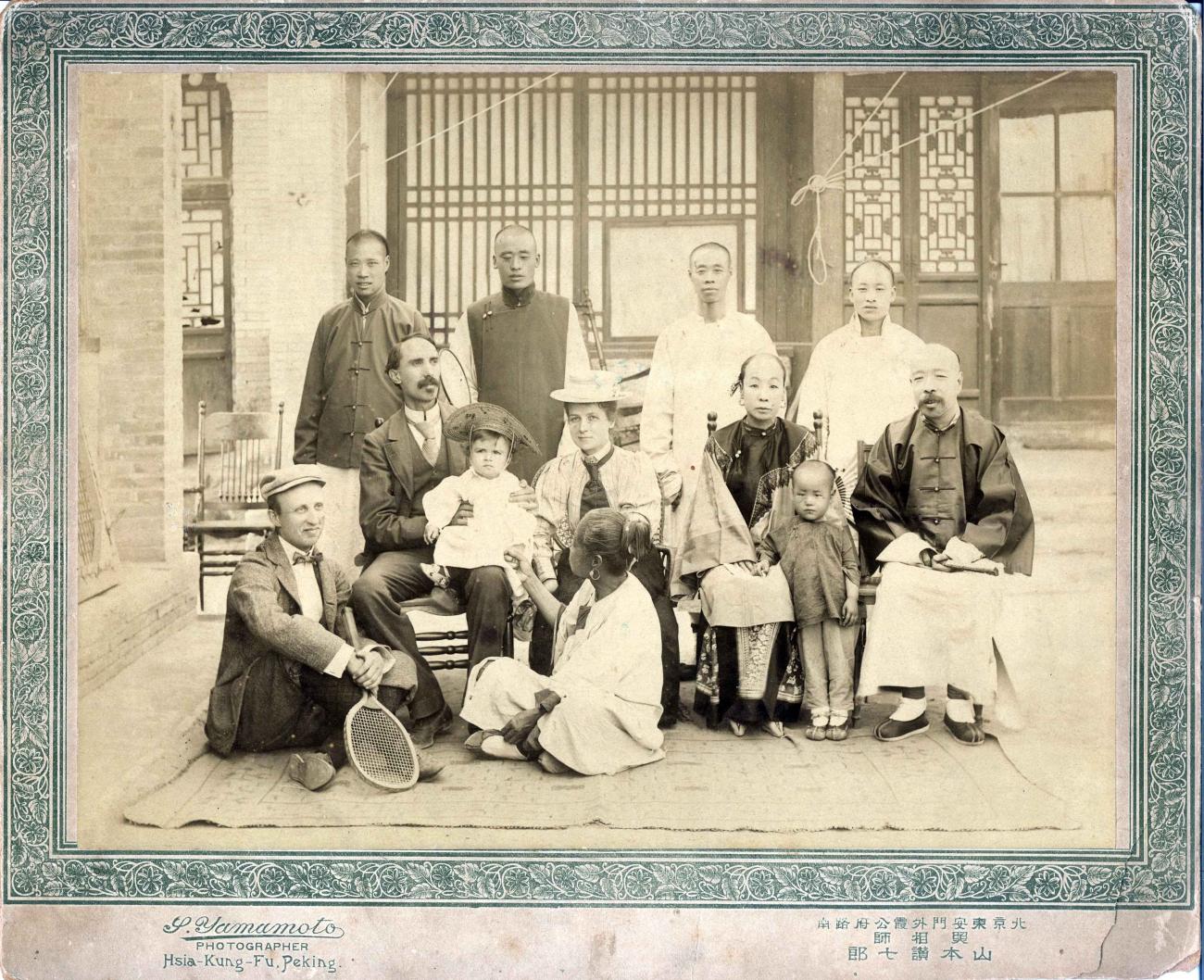 Reid family with Chinese friends in 1900