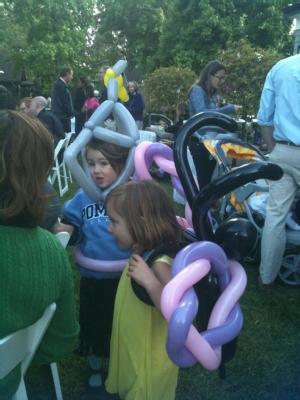 Two girls with ballon toys