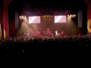 students at a sold out concert