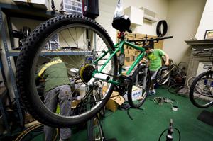 Students working on a bike