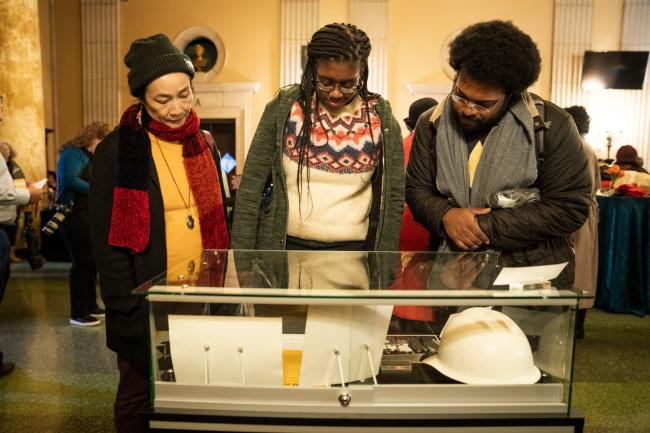 Guests admire items from the personal collection donated by civil rights leader and Pomona College alumna Myrlie Evers-Williams ’68.