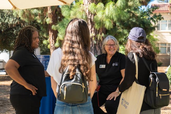 A group of people laugh