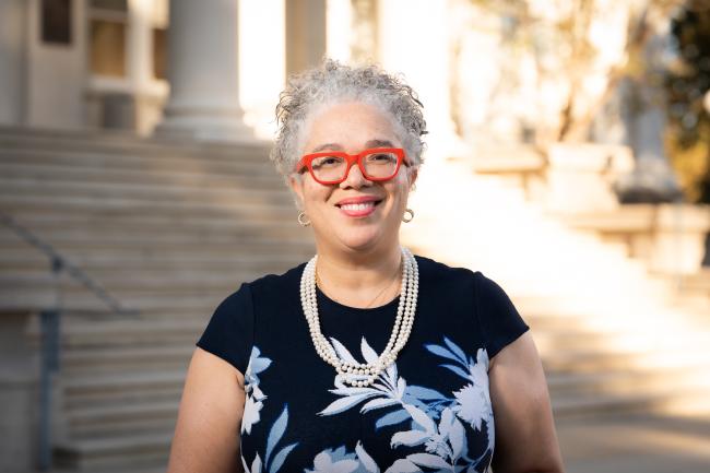 President G. Gabrielle Starr horizontal in black and flowers