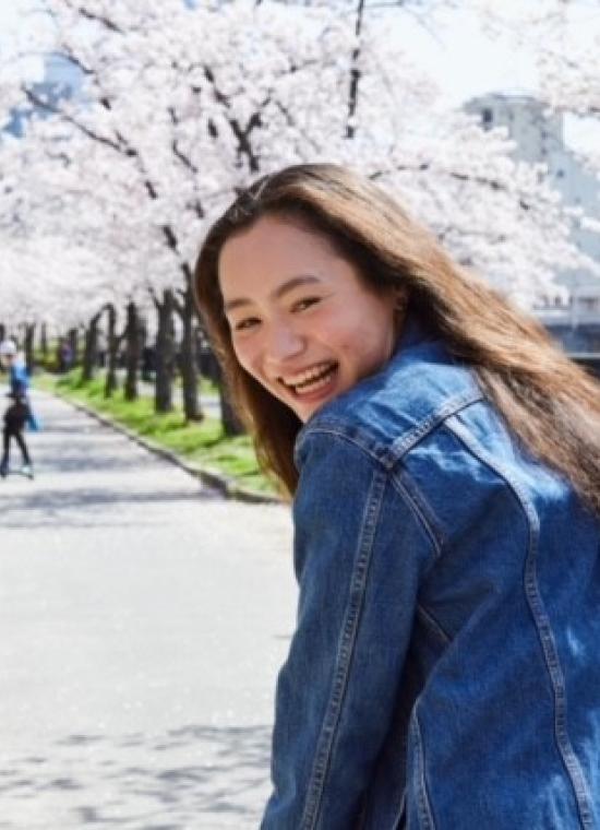 Japanese Language Resident looking back at the camera