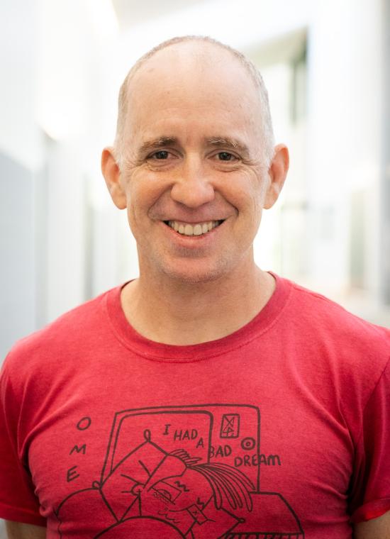 Gabe Chandler wearing red teeshirt
