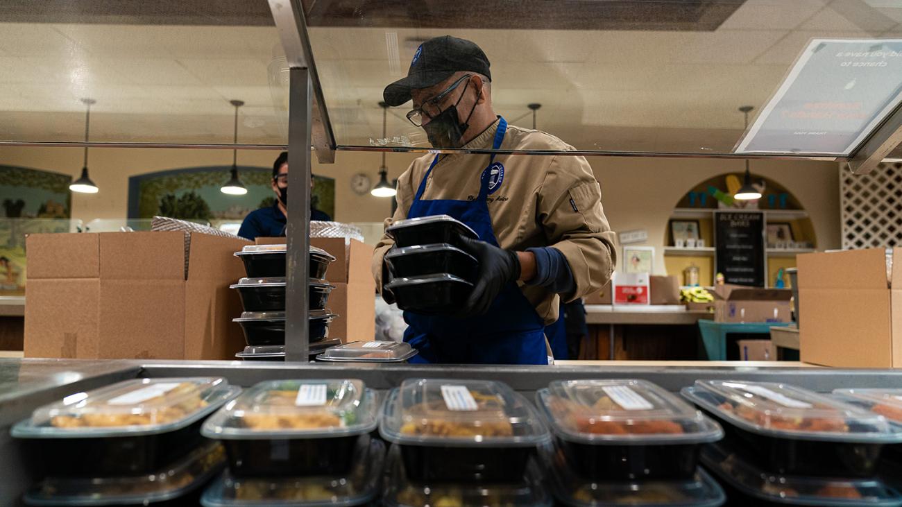 Dining staff packing food