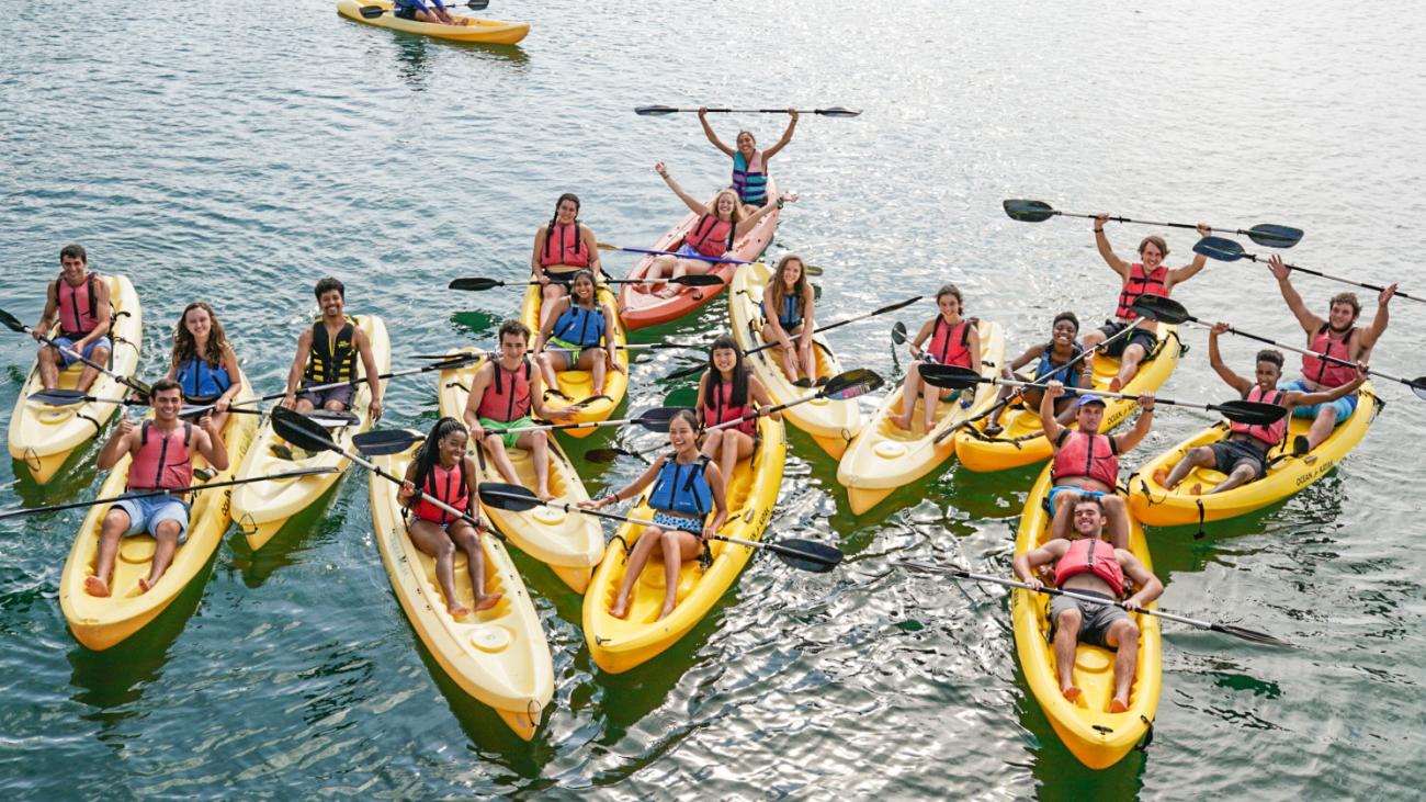 A group of students in kayaks