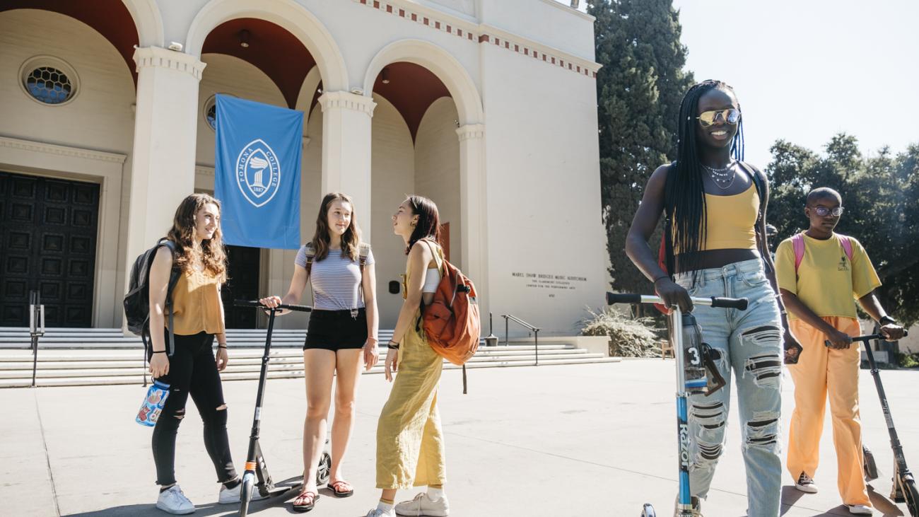 Students stand in front of Big Bridges