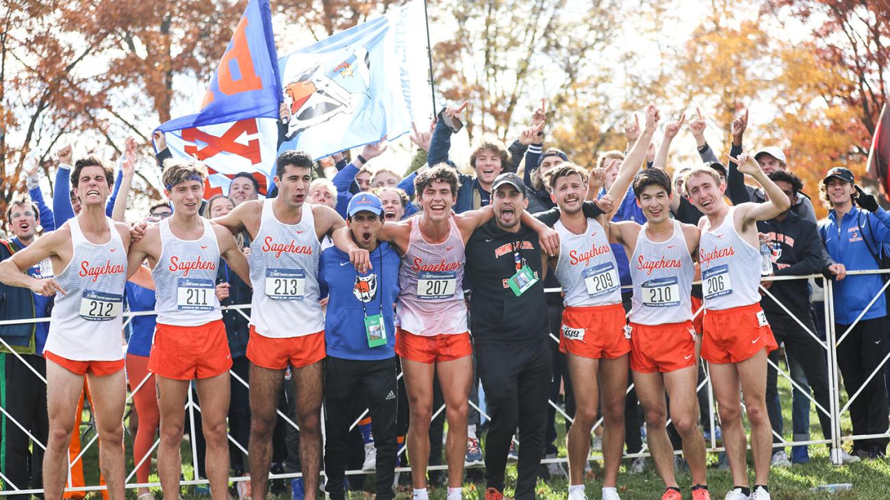 Pomona-Pitzer men's cross country team celebrating 2021 NCAA Division III national title
