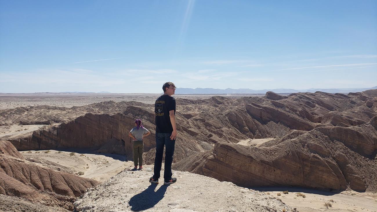 Pomona student Ascher Cipinko exploring the Borrego Badlands