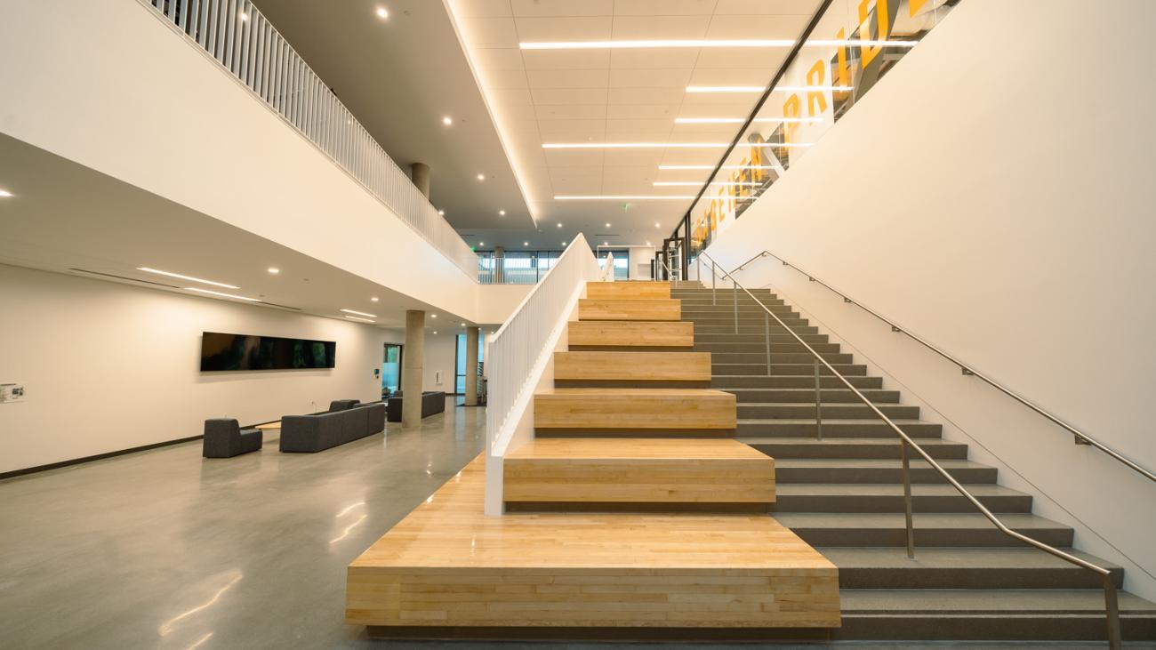 Stairway seating area leading to upstairs of Center for Athletics, Recreation and Wellness