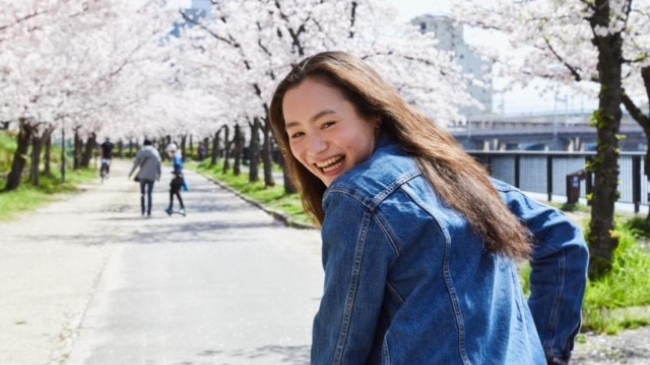 Japanese Language Resident looking back at the camera