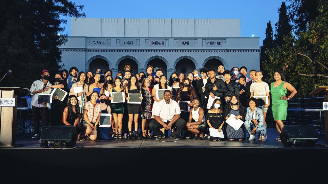 PAYS group photo in evening in front of Bridges Auditorium