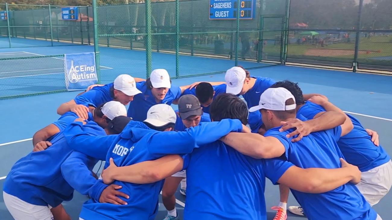 Pomona Pitzer tennis team huddle on the courts