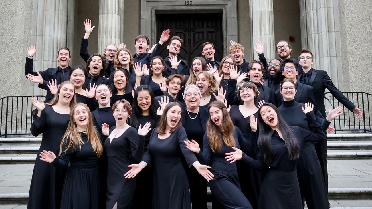 Pomona College Glee Club strikes a pose outside Bridges Hall of Music