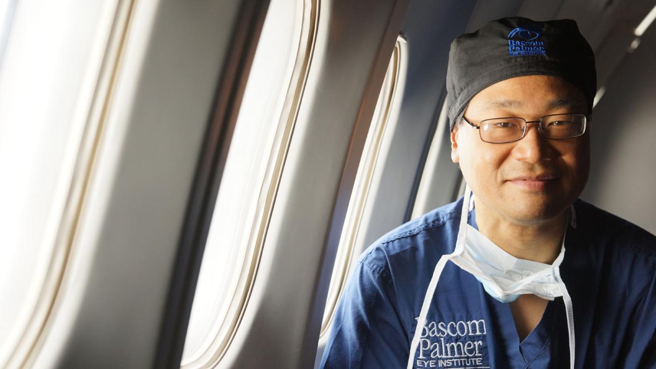 Dr. Richard Lee portrait photo in scrubs