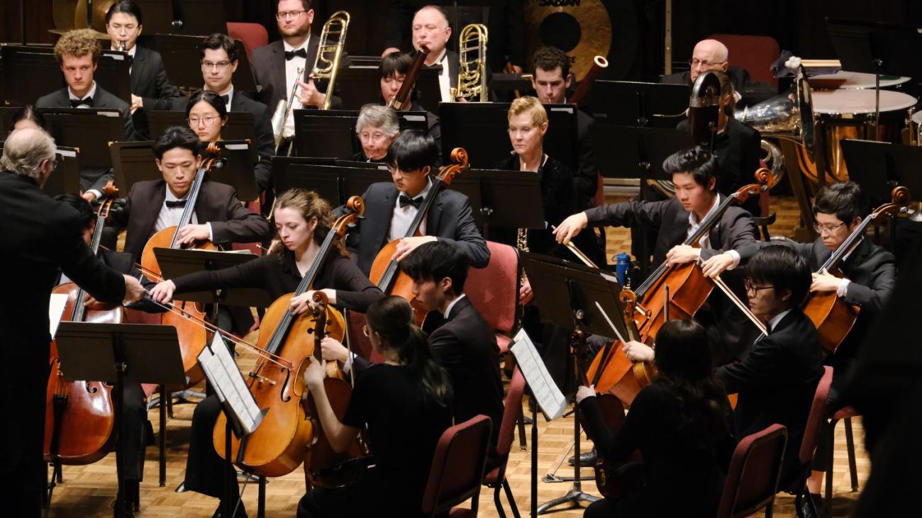 PCO cello section performing in Bridges Hall of Music