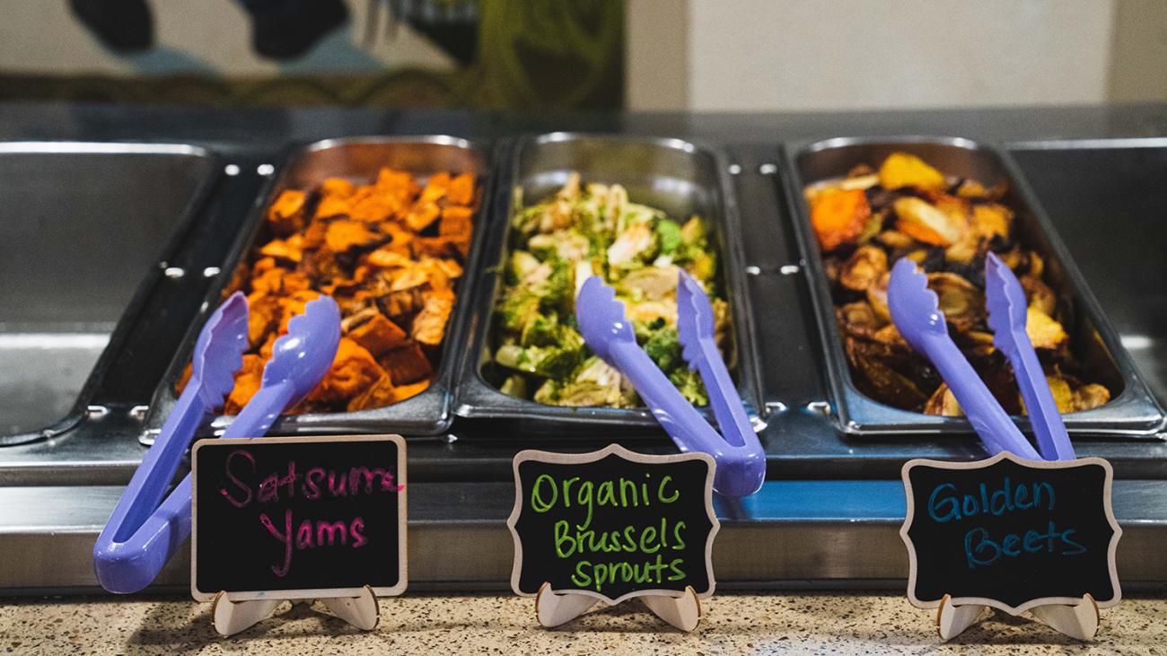 Vegetables in dining hall serving area