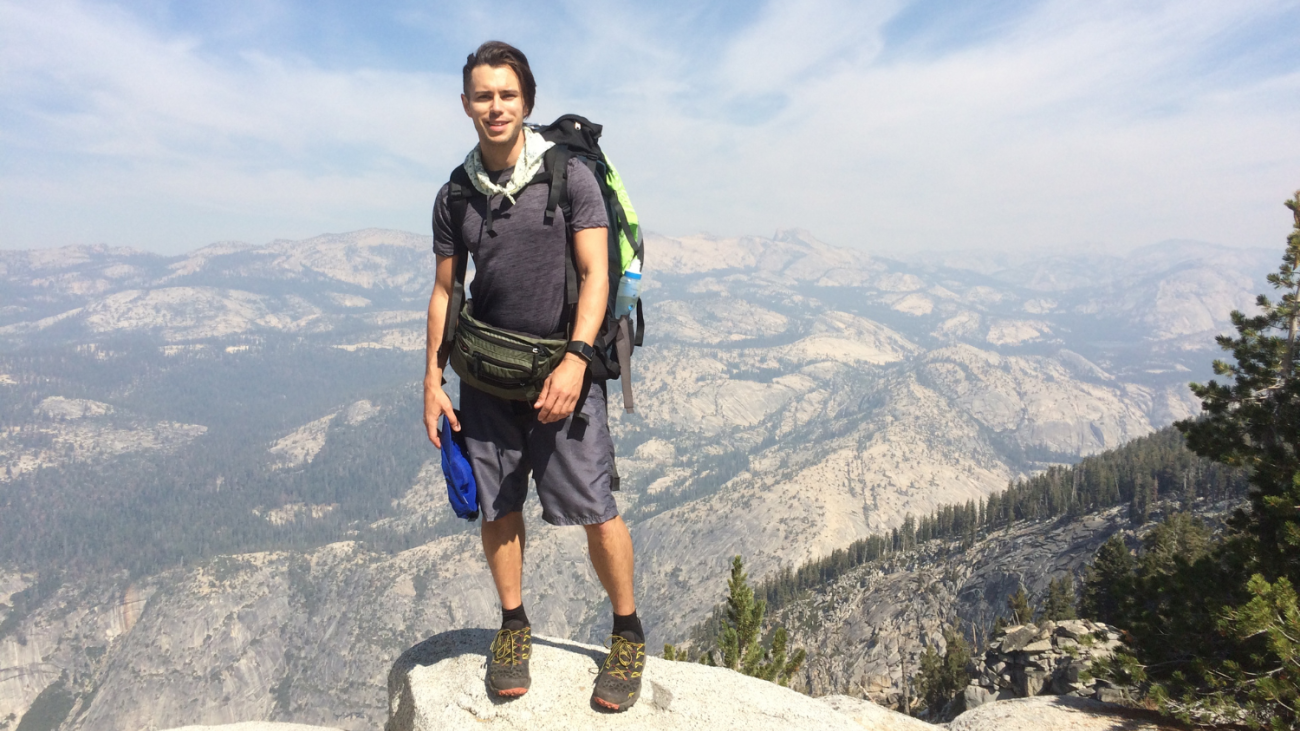 Ryan Meher posing on the Grand Canyom