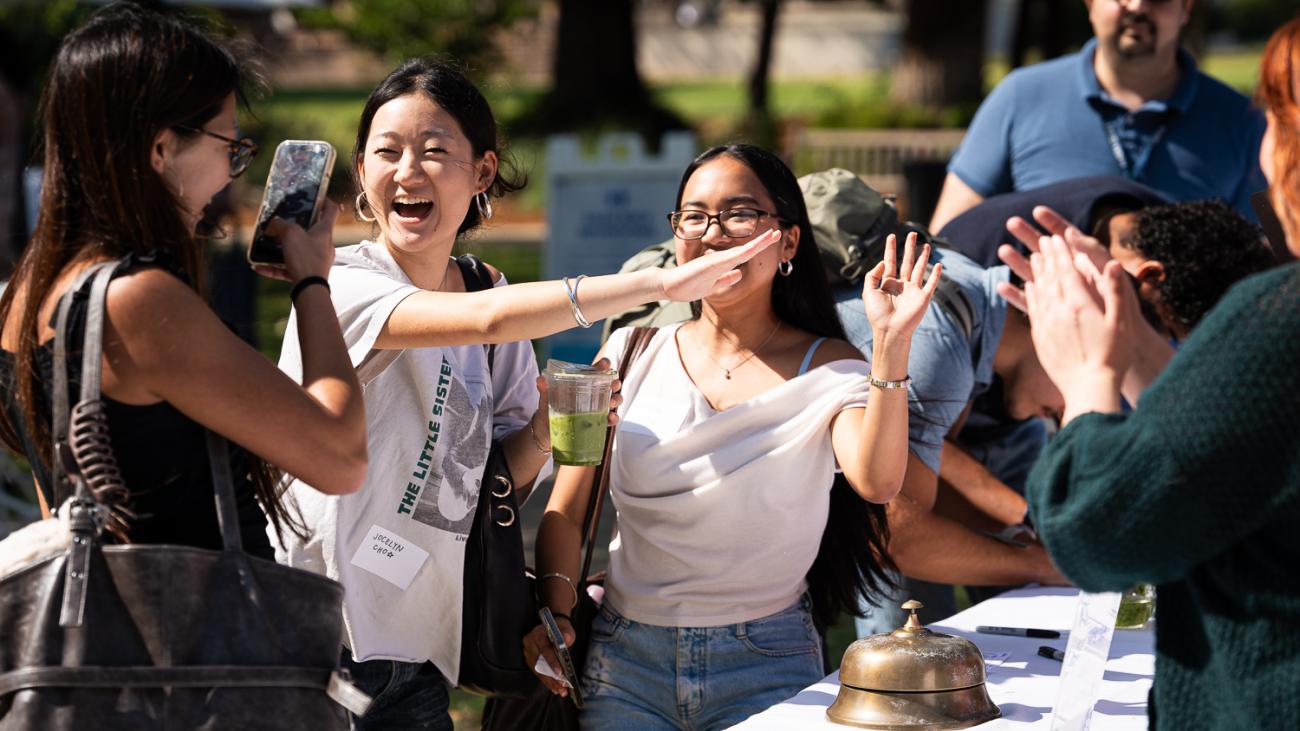 Students ring a bell