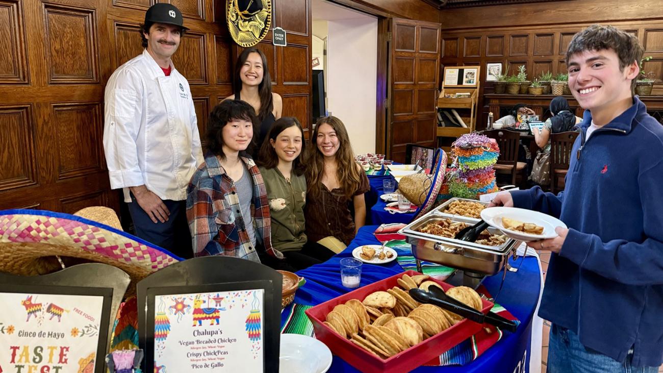 Students and chef in Frary Dining Hall at tasting event