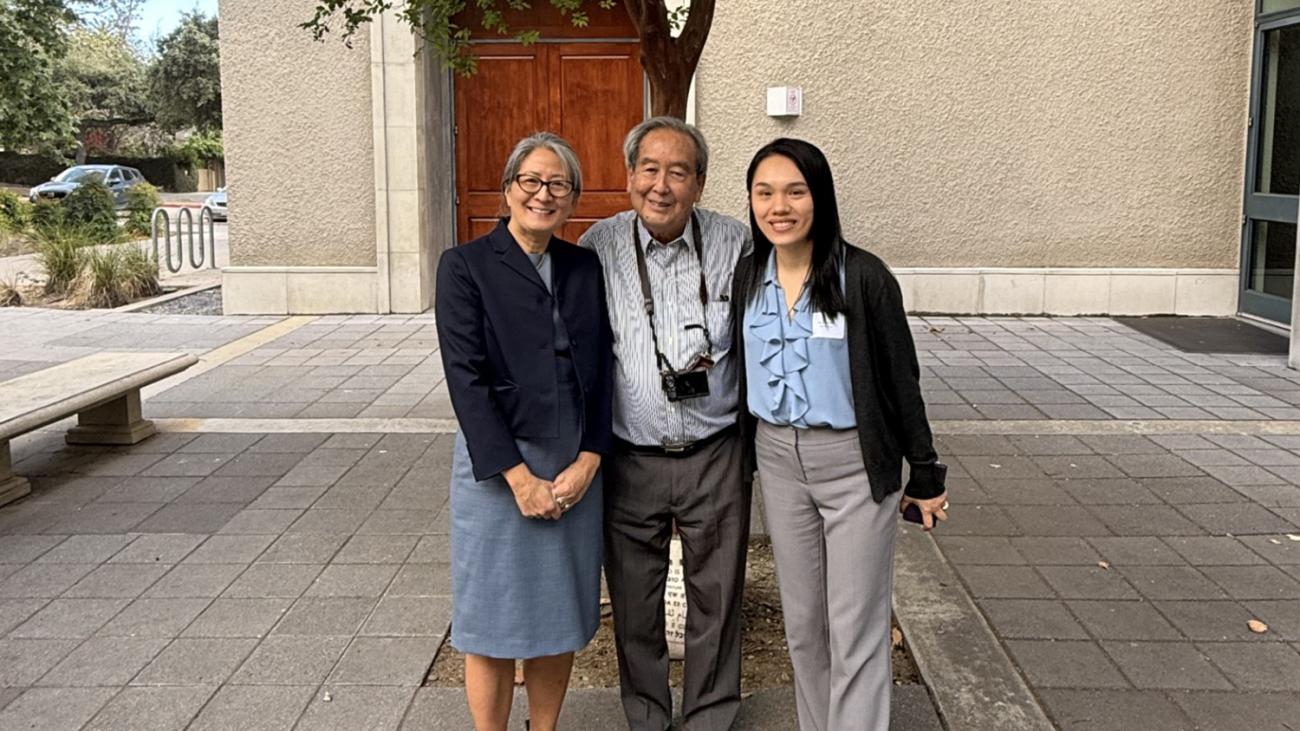 Pomona conference participants Yamashita, Hsu and Hongdeng outside of Hahn Hall