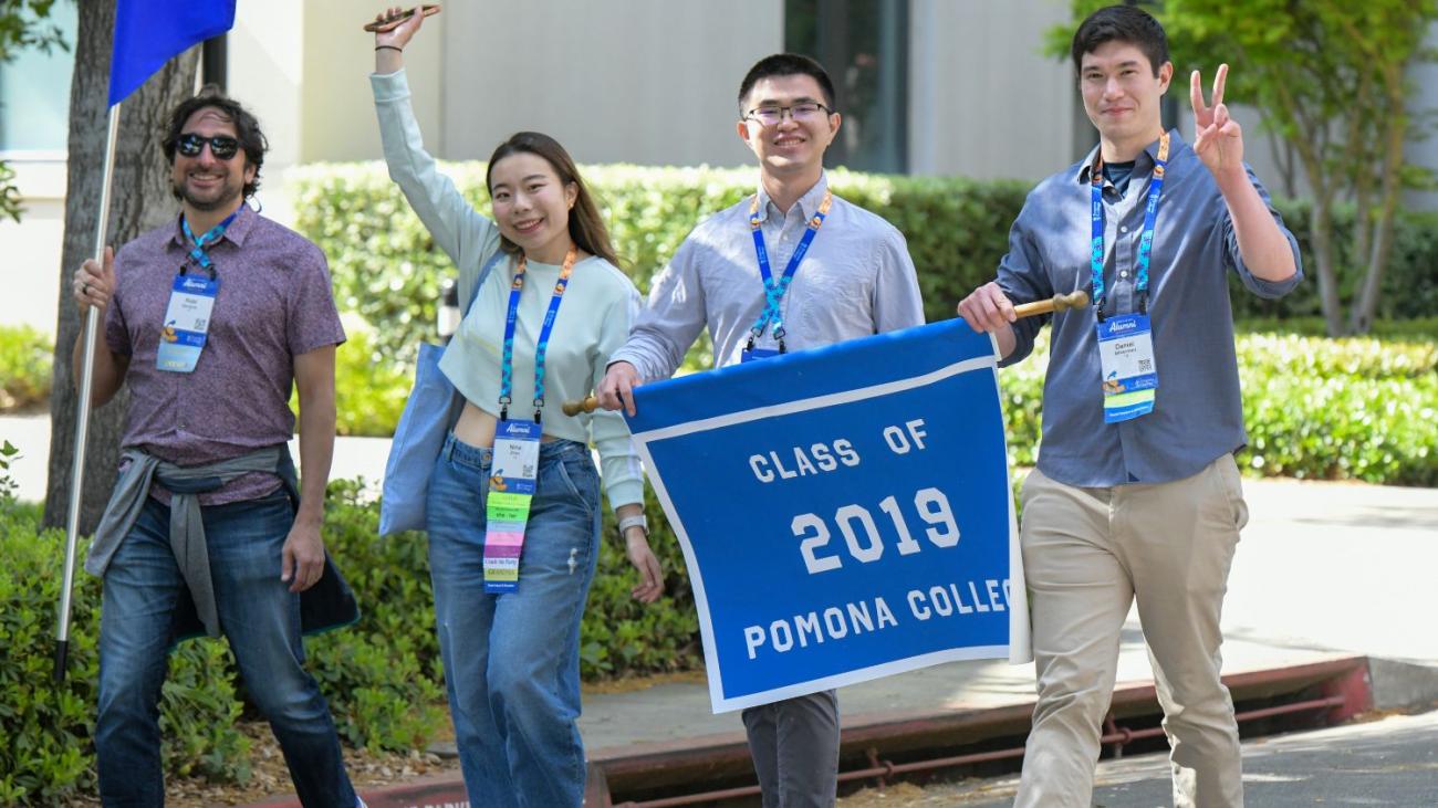 Robi with his Sagehens at alumni weekend parade of classes