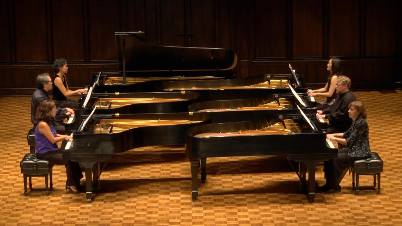 six performers on six pianos in Bridges Hall of Music