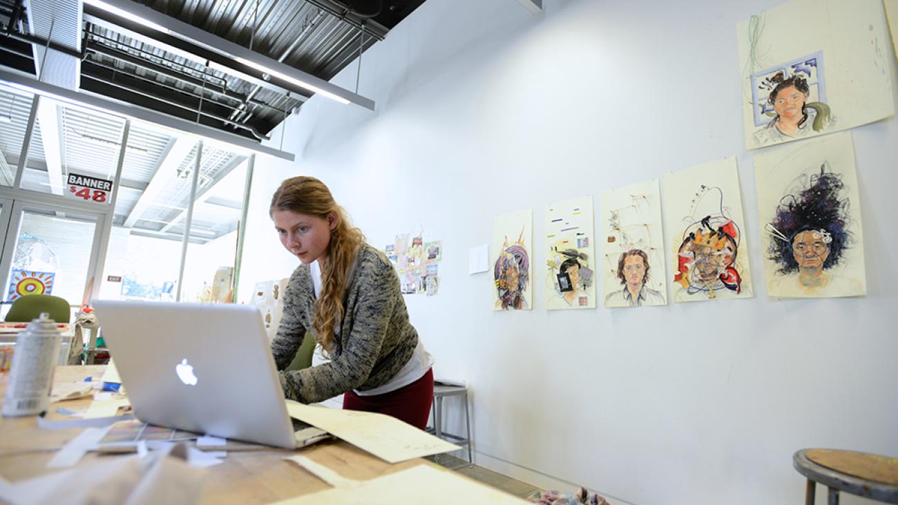 Student at work on her senior exhibit