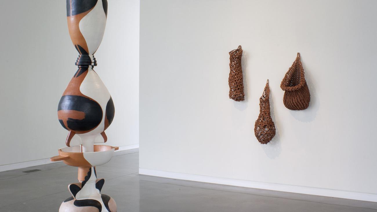 Installation view with works by Tanya Aguiñiga (right) and Cammie Staros (left)