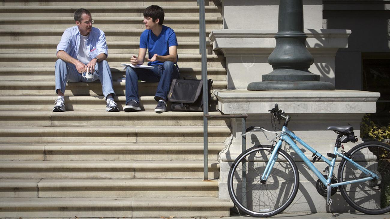 Professor David Menifee-Libey and a student on the Carnegie Hall steps