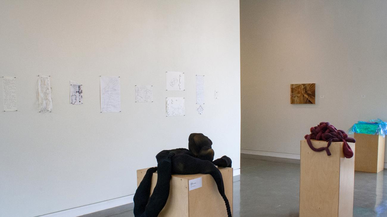 Installation view with works by Sonia Grunwald (left wall) Sara Arthur-Paratley (center pedestals), and Michelle Qin (back wall and pedestal)