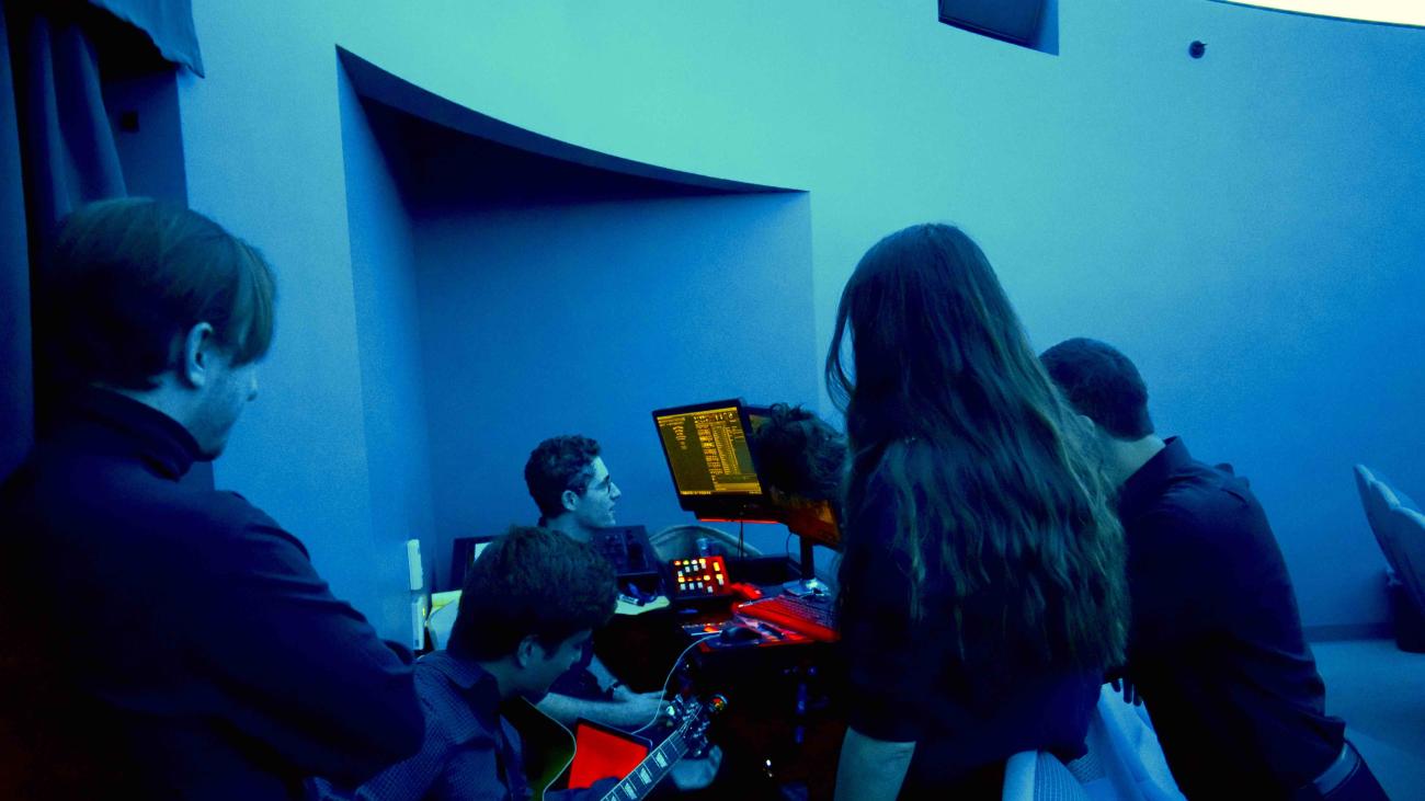 students inside planetarium