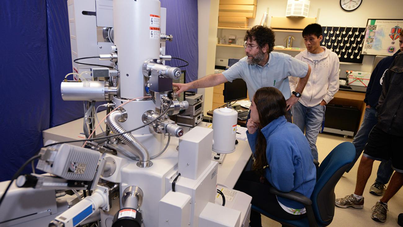 Professor David Tanenbaum with the scanning electron microscope