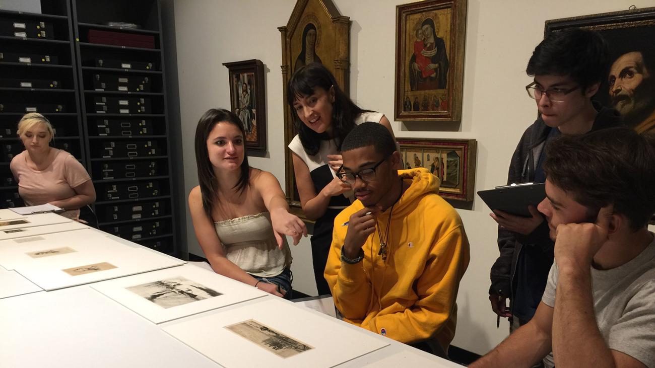 Pomona students looking at art